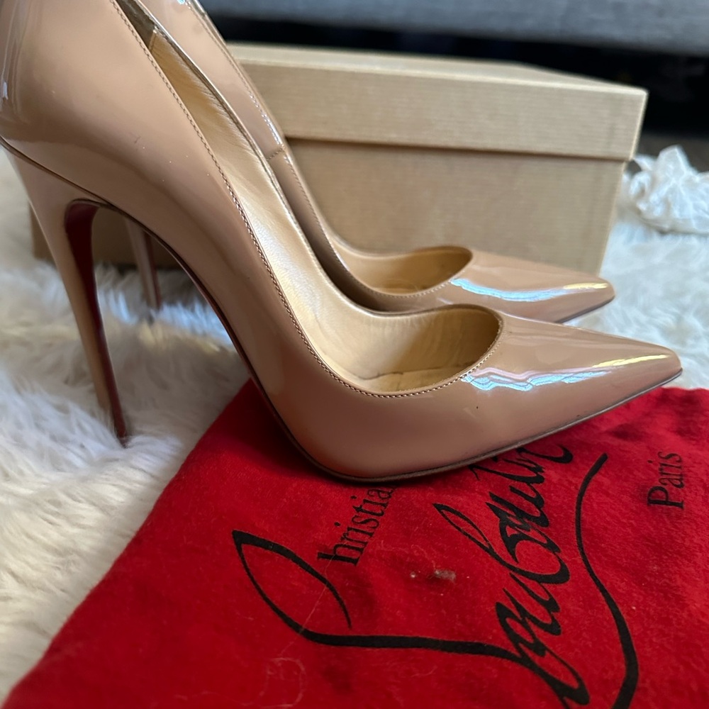 Louboutin Heels . Size 8.